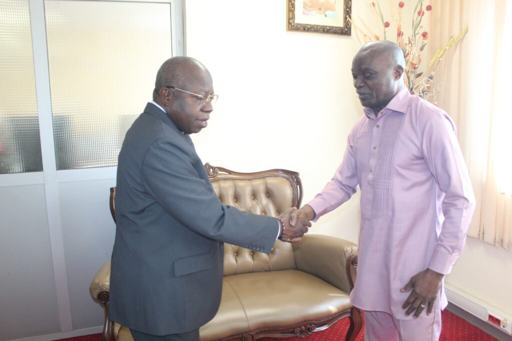 ELANGA OBAM Géorges, Minister of Decentralization and Local Development, WITH Roger Milla.